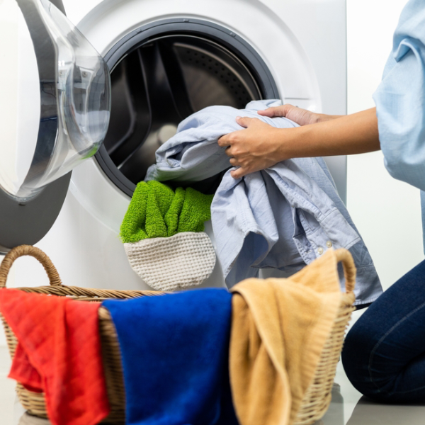 wash clothes in a washing machine